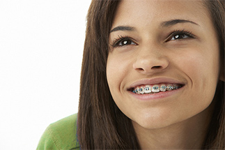 Smiling girl wearing braces